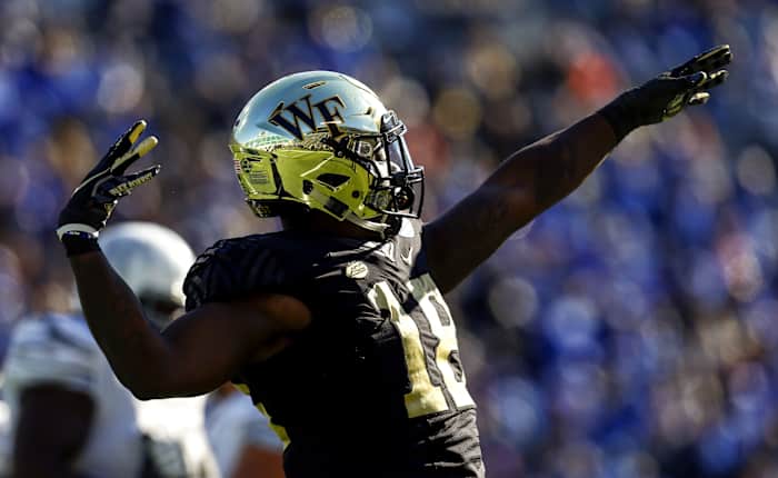 Dec 22, 2018; Birmingham, AL, United States; Wake Forest Demon Deacons defensive lineman Carlos Basham Jr. (18) celebrates after a sack on Memphis Tigers quarterback Brady White (3) during the first half of the Birmingham Bowl at Legion Field.